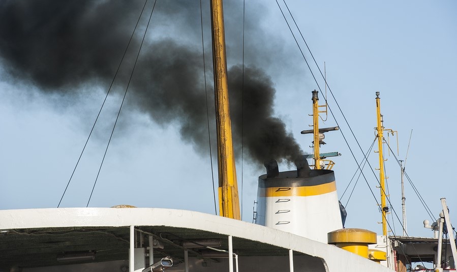 Smoke from a cargo boat polluting the air